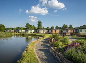 Lake edge luxury holiday lodges at Arrow Bank photo