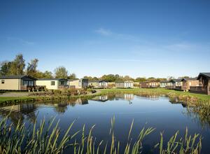 Lake edge luxury holiday lodges at Arrow Bank photo