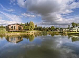 Lake edge luxury holiday lodges at Arrow Bank photo