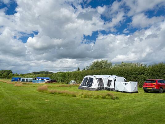 Spacious, relaxing camping pitches at Arrow Bank