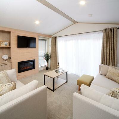 Atlas Jasmine Lodge for sale at 5 star caravan park - lounge photo