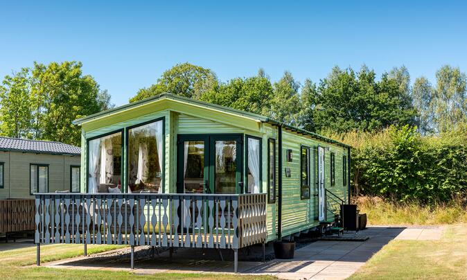 BK Bluebird Grosvenor holiday home for sale on 5 star caravan park - plot photo