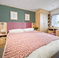 ABI Roecliffe caravan holiday home for sale at Discover Parks master bedroom photo