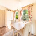 Willerby New Hampton for sale on 5 star caravan park - dining area photo