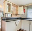 Willerby Avonmore holiday home for sale on riverside plot at Arrow Bank. Kitchen photo