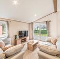 Luxury self-catering holiday lodge at Arrow Bank - lounge photo 1