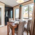 Pemberton Rivington for sale at Arrow Bank 5 star caravan park, Herefordshire - dining area photo